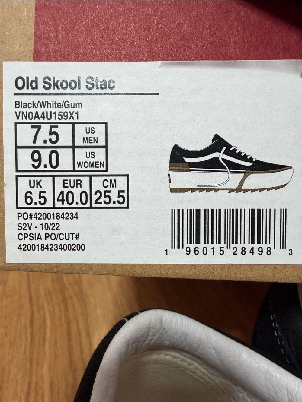 Platform Vans Black and White Low-Top Sneaker with Brown Accent